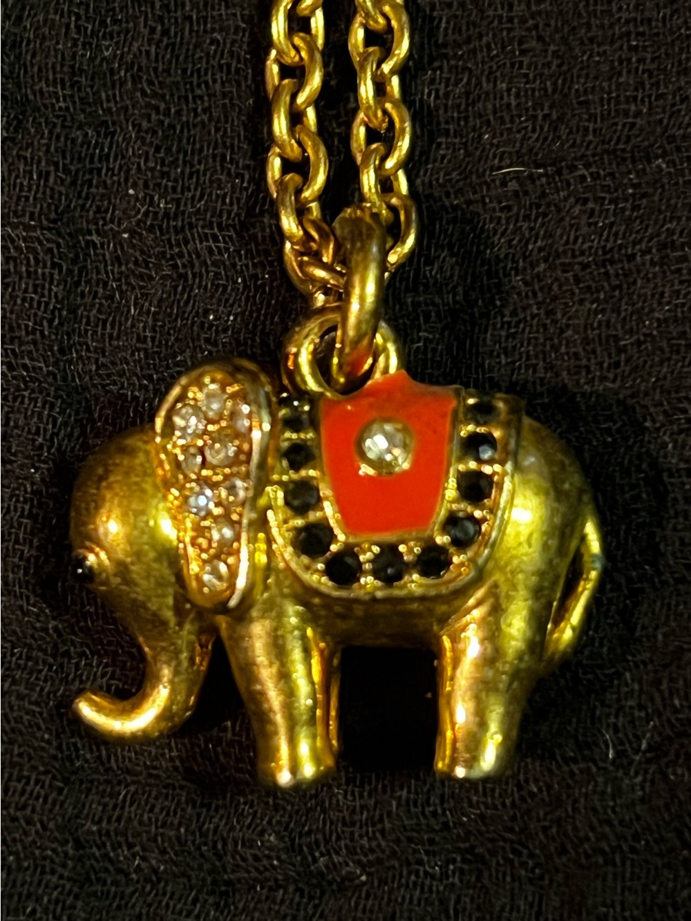 Juicy Couture Gold Elephant Pendant Necklace with Red and Black Accents